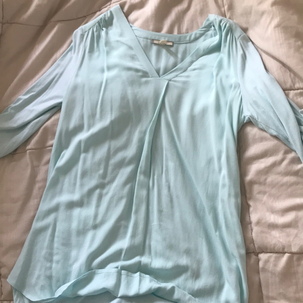 3/4 length sleeve, baby blue blouse. Oversized fit